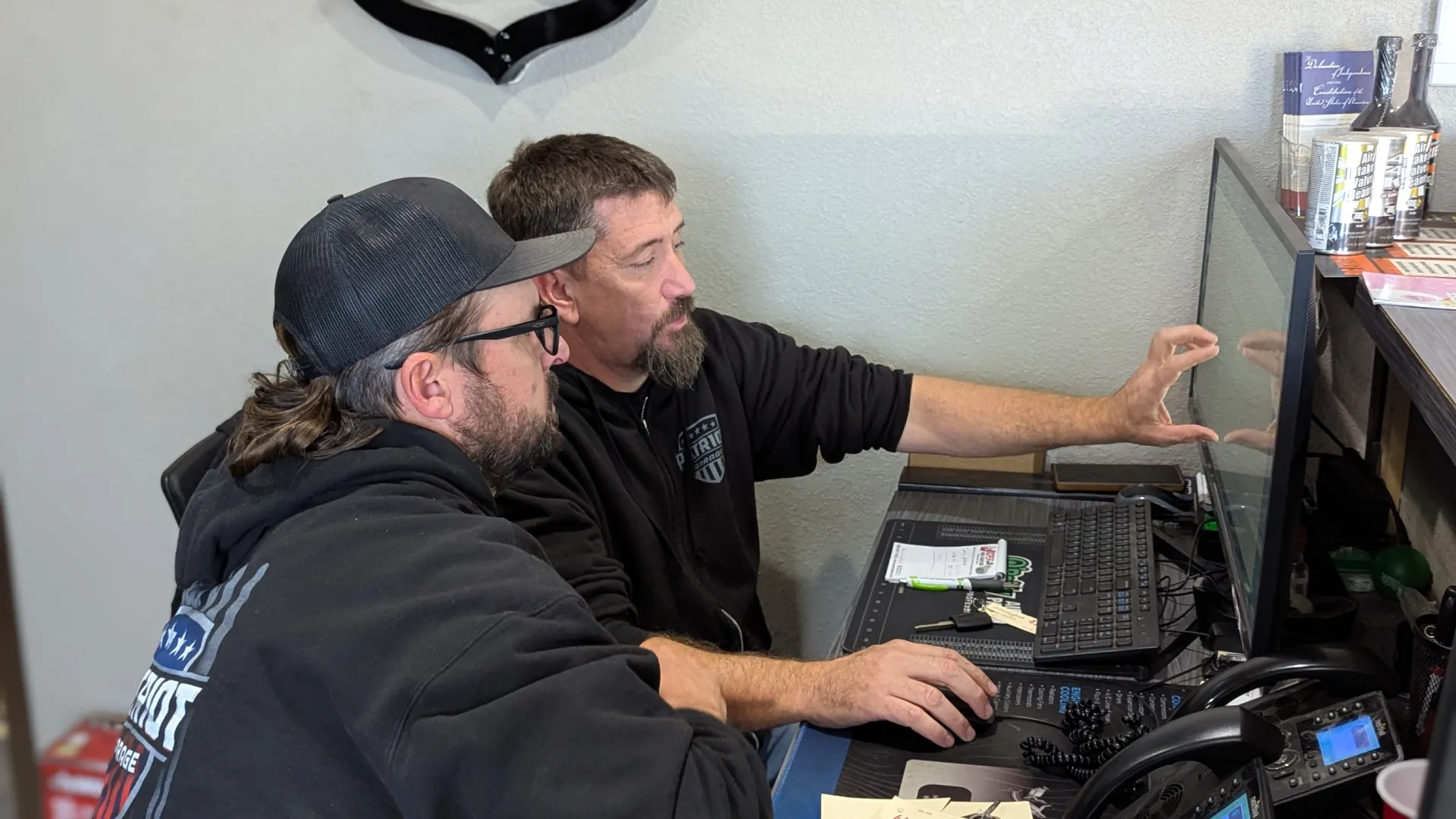 Patriot Garage service team working on vehicle diagnostics in Yukon shop